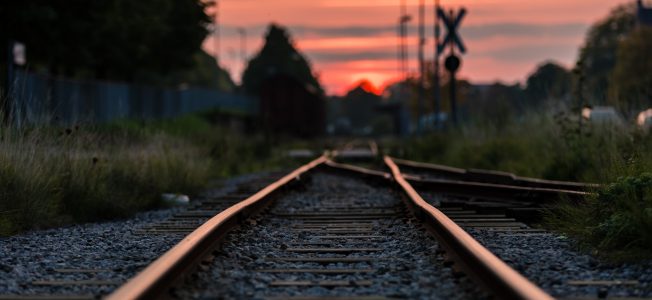 railway tracks-clouds-horizon